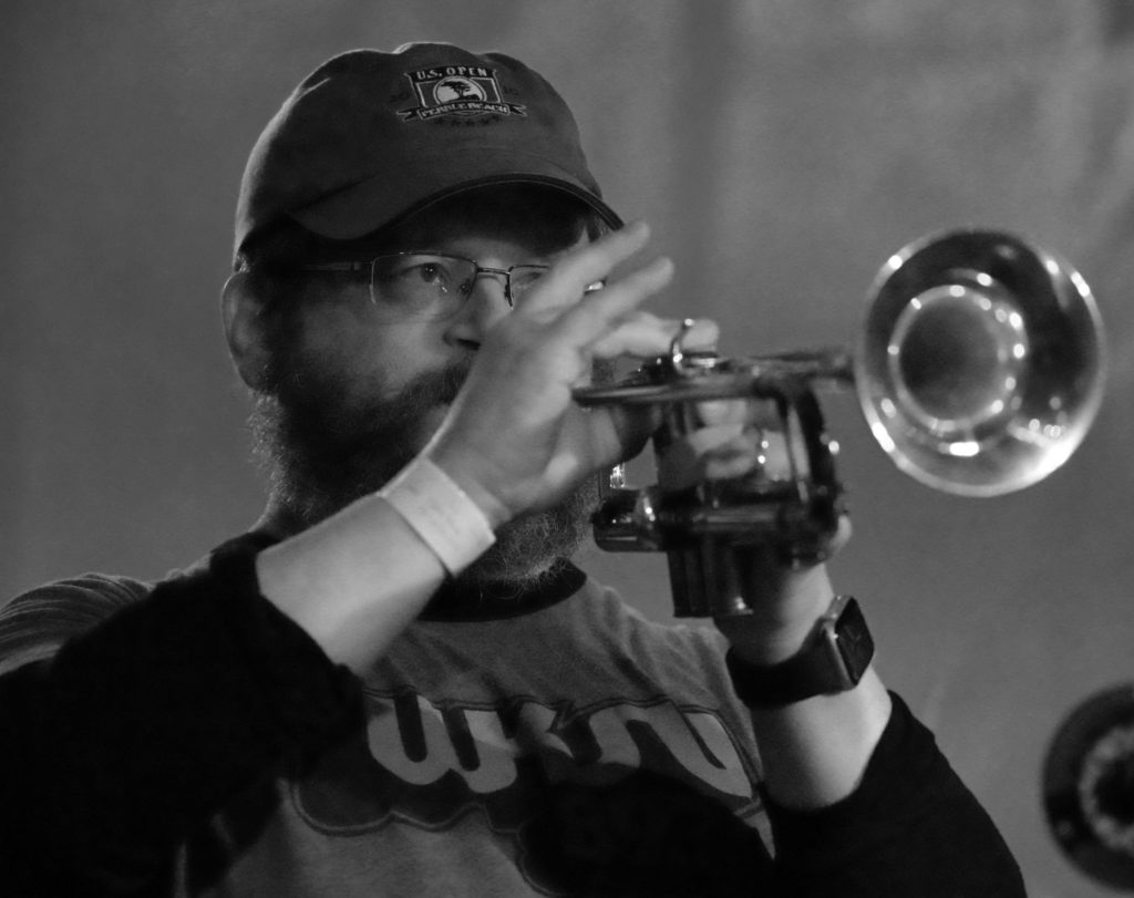 Black and white photo of trumpet player
